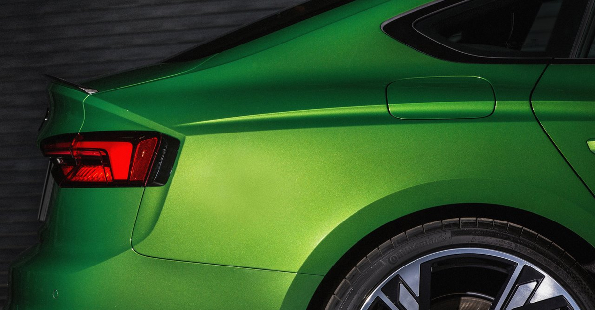 Close-up of a green car with pearlescent paint